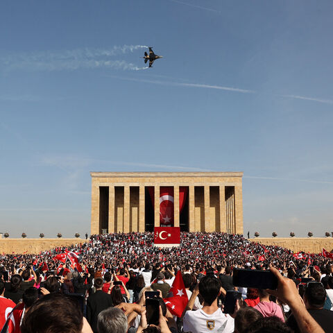 The Soloturk aerobatic demonstration team of the Turkish Air Force flies an F-16 aircraft over Anitkabir, the mausoleum of Turkish Republic's Founder Mustafa Kemal Ataturk, during celebrations to mark the 100th anniversary of the Republic of Turkey in Ankara, on October 29, 2023. Turkey marked its centenary as a post-Ottoman republic on October 29, 2023, with somewhat muted celebrations held in the shadow of Israel's escalating war with Hamas militants in Gaza. (Photo by Adem ALTAN / AFP) (Photo by ADEM ALT